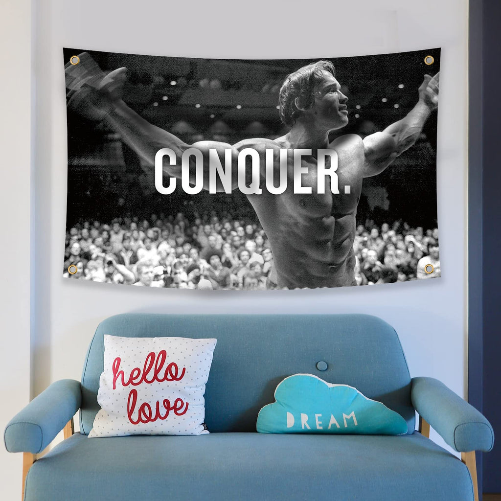 Arnold Schwarzenegger Conquer Motivational Inspirational Office Gym Wall Decor Flag Banner，3x5 Feet Flag Funny Poster Durable Man Cave Wall Flag with Brass Grommets This beautiful entertaining banner flag for College Dorm Room Decor,Outdoor,Parties gifts