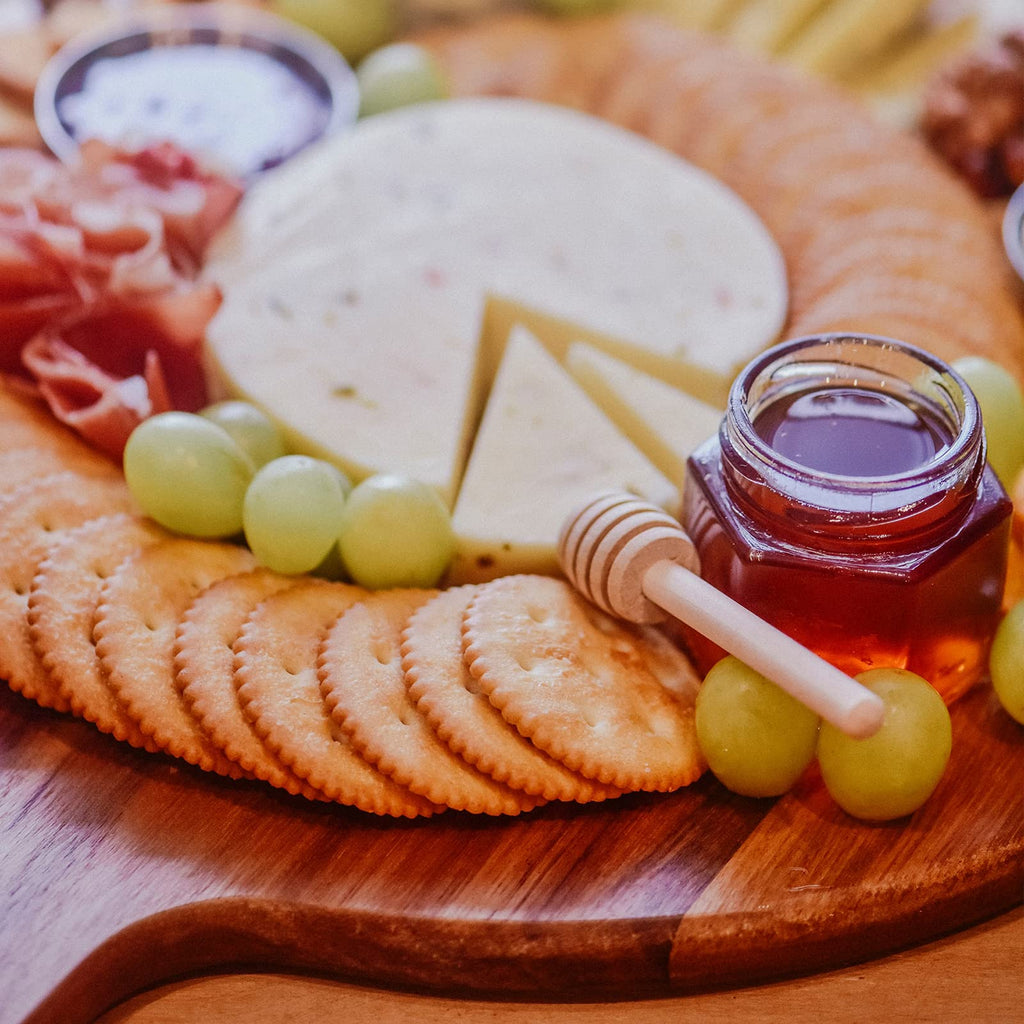 Dicunoy Acacia Wood Pizza Peel, 12" Wooden Cutting Board, Round Charcuterie Board with Handle, Wooden Pizza Paddle, Cheese Paddle Fruit Chopping Board Tray for Bread, Vegetables, RV, Camping