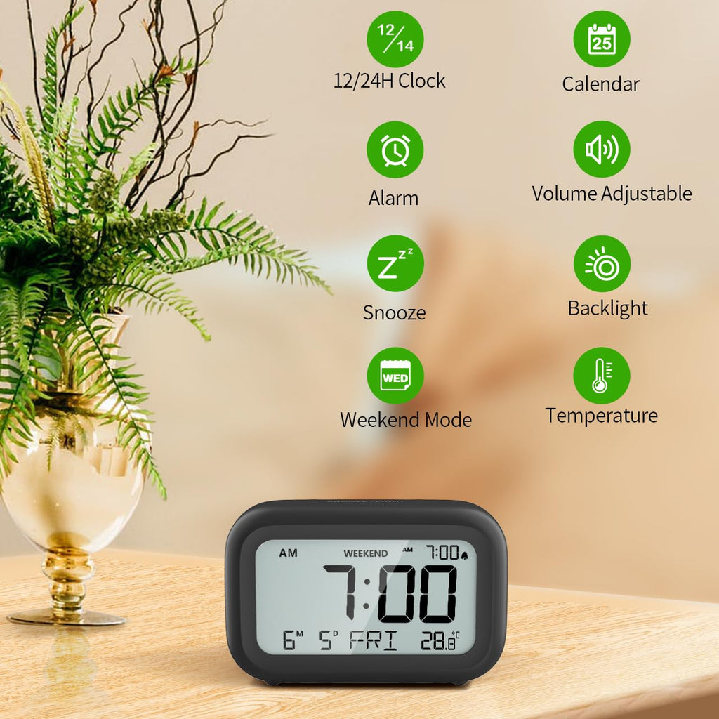 DOOMAY Digital Alarm Clock Bedside - Battery Powered Clock with LCD Display Volume Adjustable Snooze and Weekend Mode for Bedroom Office Desk Travel (Black)