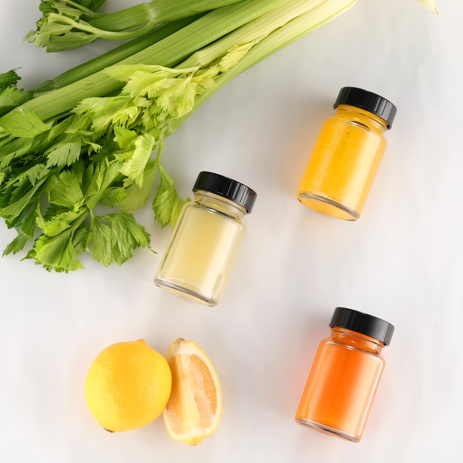 VOLCANOES CLUB 2oz Glass Jars with Lids - Glass Shot Bottles Set for Liquids, Juicing, Ginger Shot, Sample - Small Containers with Screw Caps - Clear Mini Round Bottles - Leakproof/Wide Mouth/16 pack