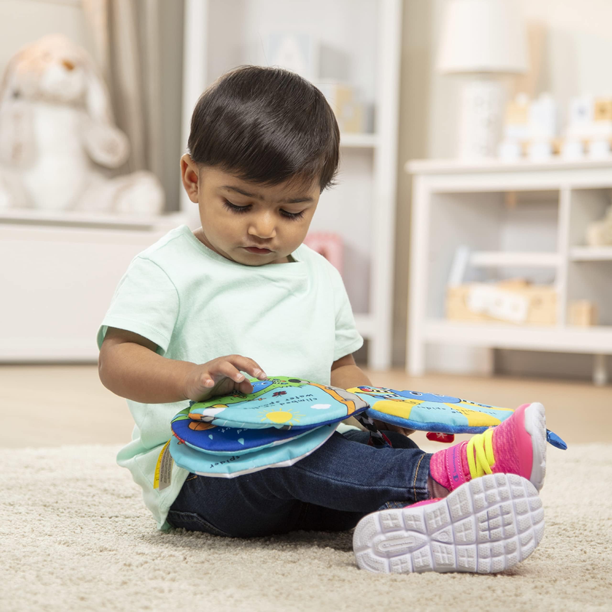 Melissa & Doug K's Kids Itsy-Bitsy Spider 8-Page Soft Activity Book for Babies and ToddlersCloth Baby Book and Sensory Toy with Textures to Grasp and Play Peekaboo, Ages 1 Month+